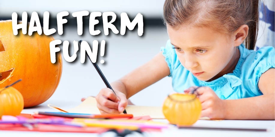 Child writing with a pen