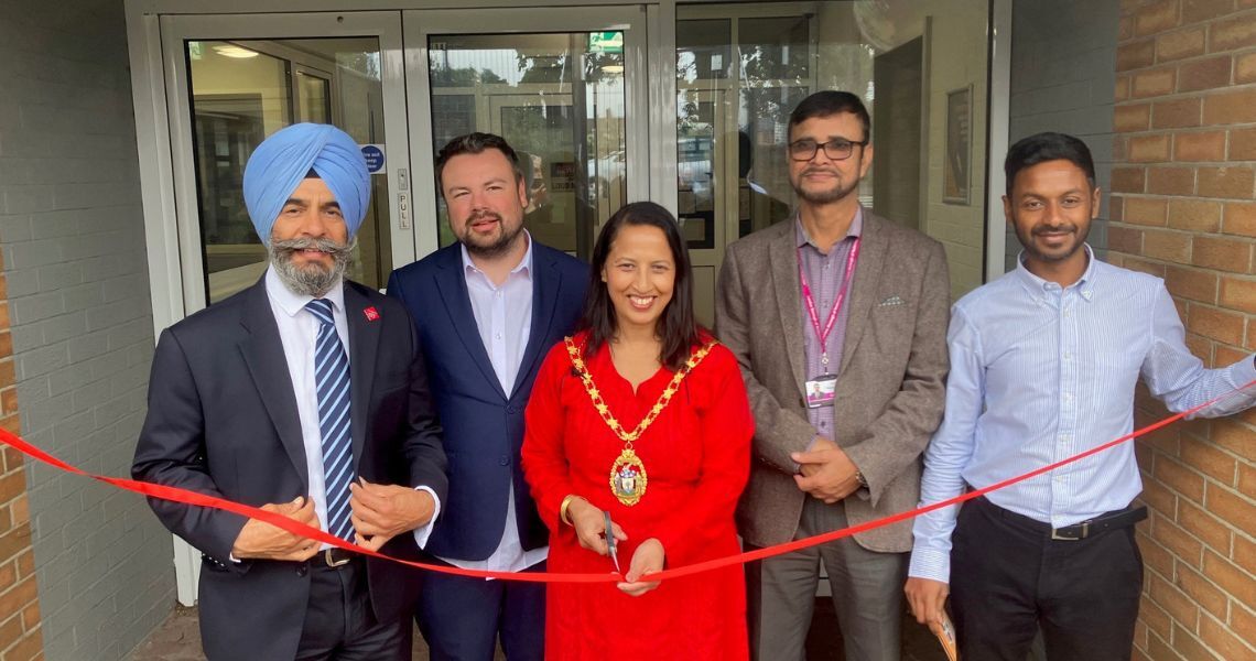 Leader and Mayor cutting a ribbon outside Constance Bridgeman Centre