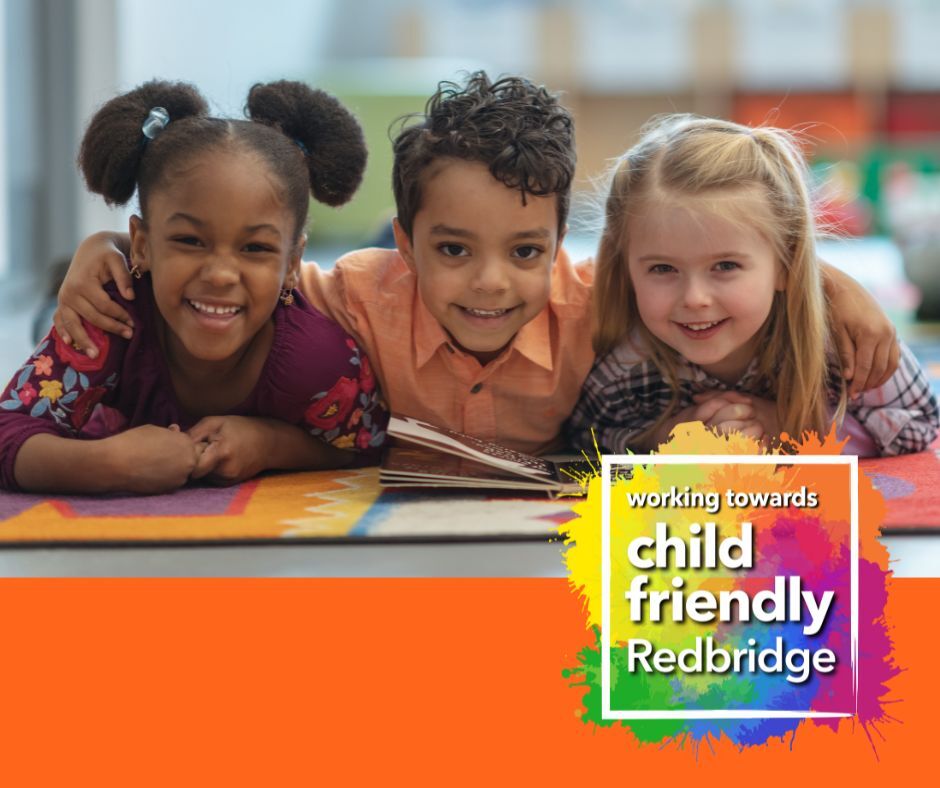 Three young children hugging