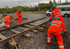 Rail track training in action - trainees dressed in trackside hi-vis clothing 