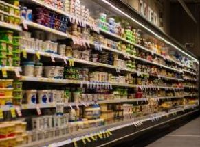 Supermarket shelves full of food