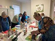 The Learning Community in Dinnington taking part in nutrition guidance and a healthy eating cooking lesson.   