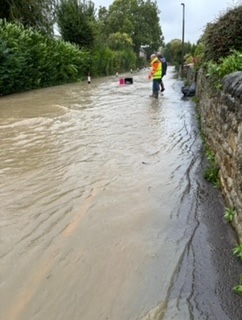  Surface water flooding on road in Brookhouse