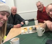 People sat around table