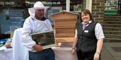 Image of beekeeper and fund manager