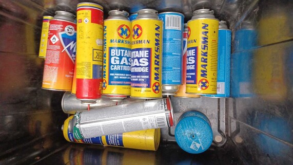 A number of gas canisters found in household recycling