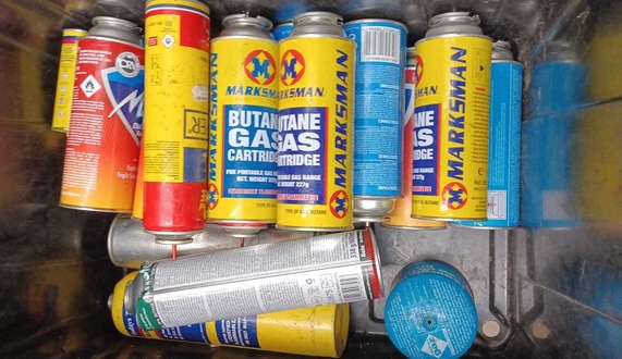 A number of gas canisters found in household recycling