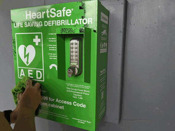 1 Defibrillator being cleaned 2 Inside a defibrillator box 3 Mirror inspecting a fire door 4 Flat block before inspection 5 Damaged wire in flat block