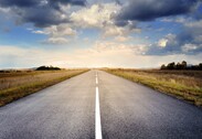 Road and horizon with grassy verges