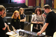 Young students at Westlands Entertainment Venue learning how to use the technical equipment with the Technical Team