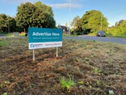 Somerset Council "Advertise Here" sign on a roundabout