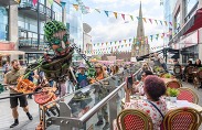 Eko the giant puppet entertaining the public