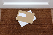 Envelopes on a doormat