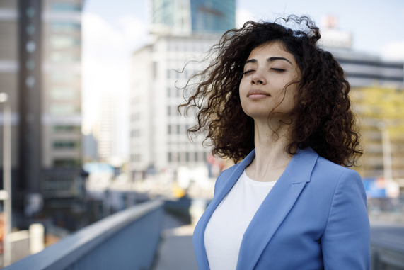 Photograph of woman taking time out