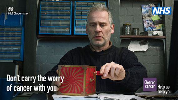 DHSC/NHS social image of a middle-aged man winding up a music box, captioned 'Don’t carry the worry of cancer with you'