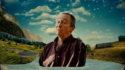 Celebrity Paul Whitehouse in fron of an image of a river