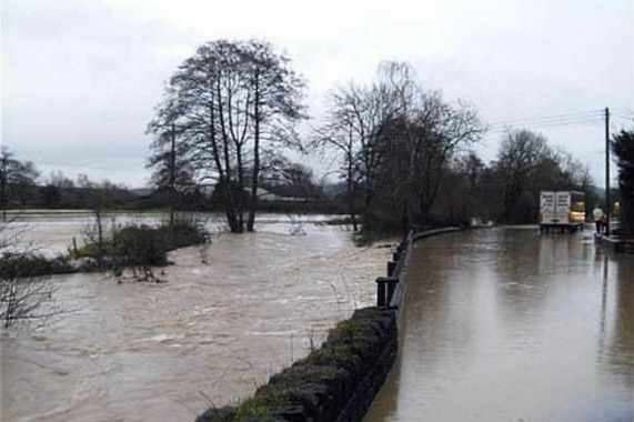 A heavily flooded road and field at Donyatt, Somerset.