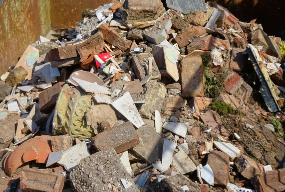 Bricks in a skip at the recycling site