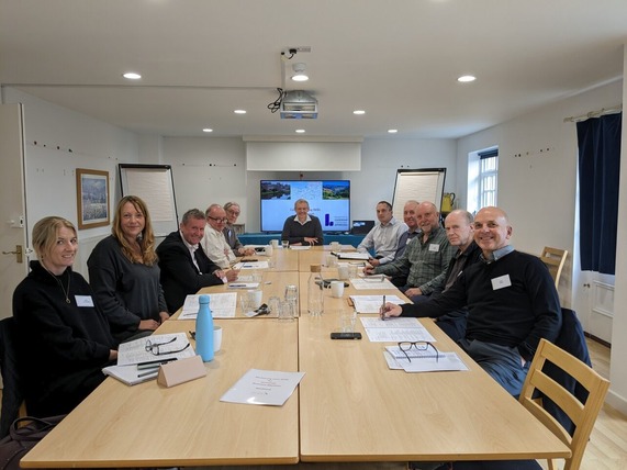 Business Mentors around a table