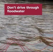 Social graphic of a flooded road, captioned: 'Don't drive through flood water'.