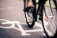 City bicycle riding on bike path.