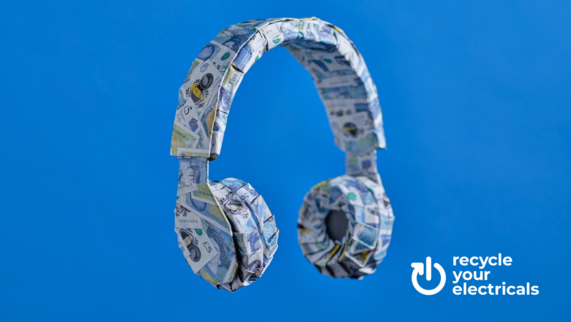 A pair of headphones wrapped in five pound notes - Recycle your electricals campaign.