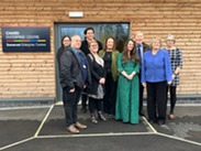 Group photo of Councillors, staff and new tenant outside Chard Enterprise Centre.