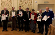 Aldermen presented with their awards.