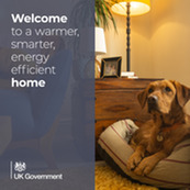 DESNZ social graphic featuring a dog in its bed, in a warm living room, captioned: 'Welcome to a warmer, smarter, energy efficient home.'