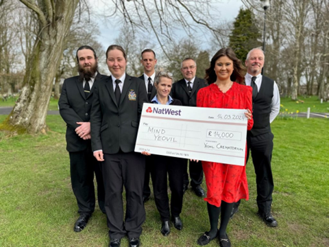 Yeovil Crematorium team holding large cheque for mind