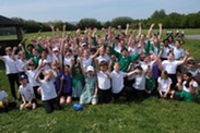 Pupils at Somerset Bridge school celebrate outside.