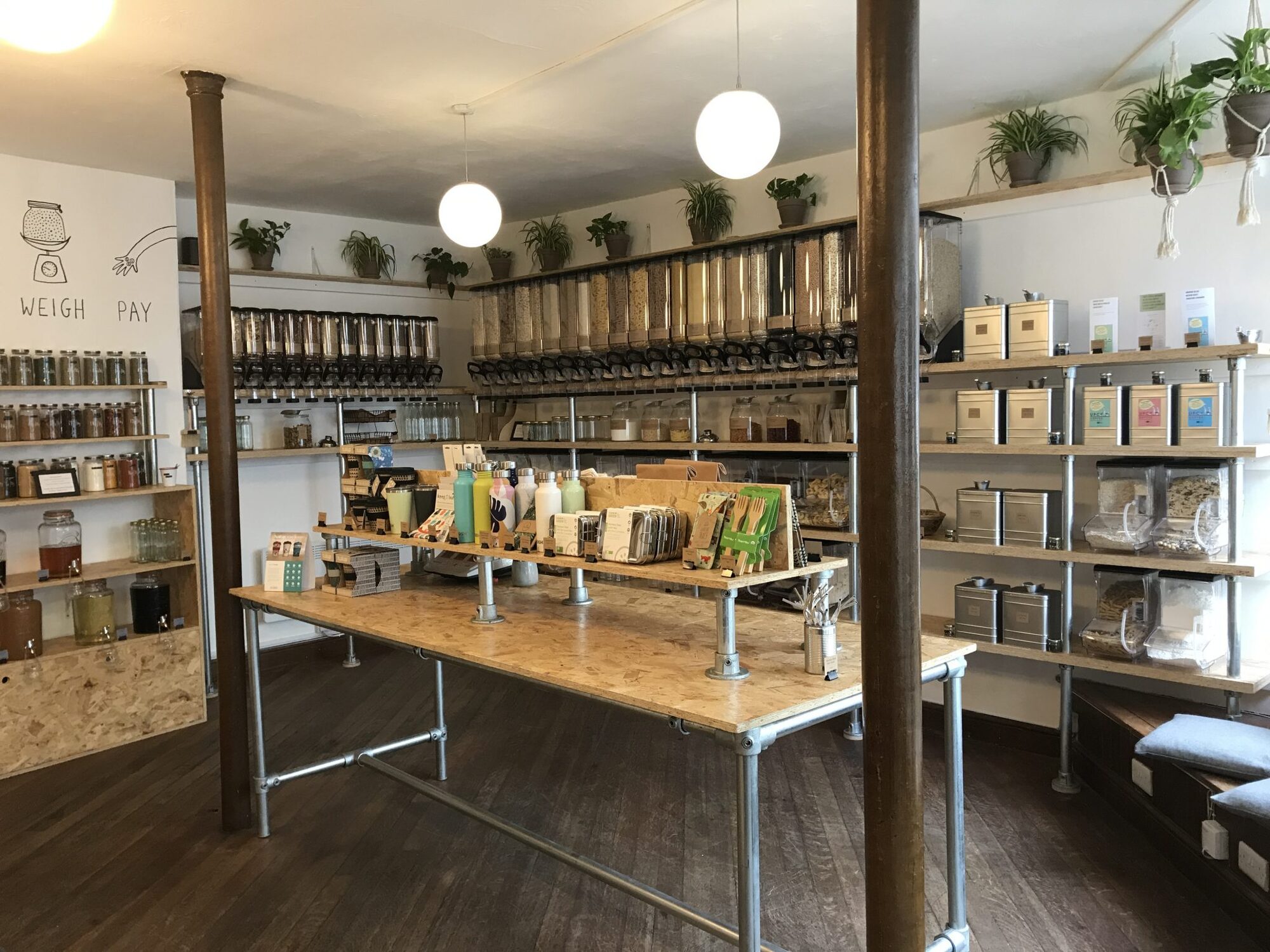 image inside Denude zero waste store depicting refill stations