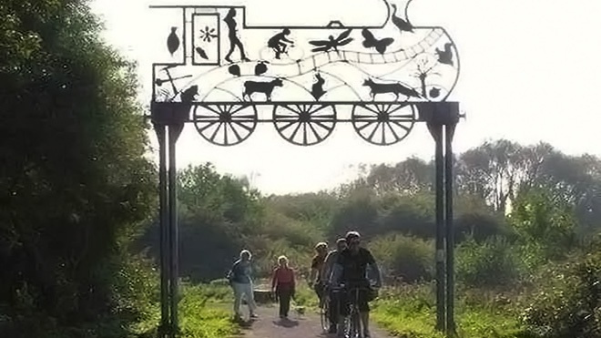 A group of cyclists on the Strawberry Line.