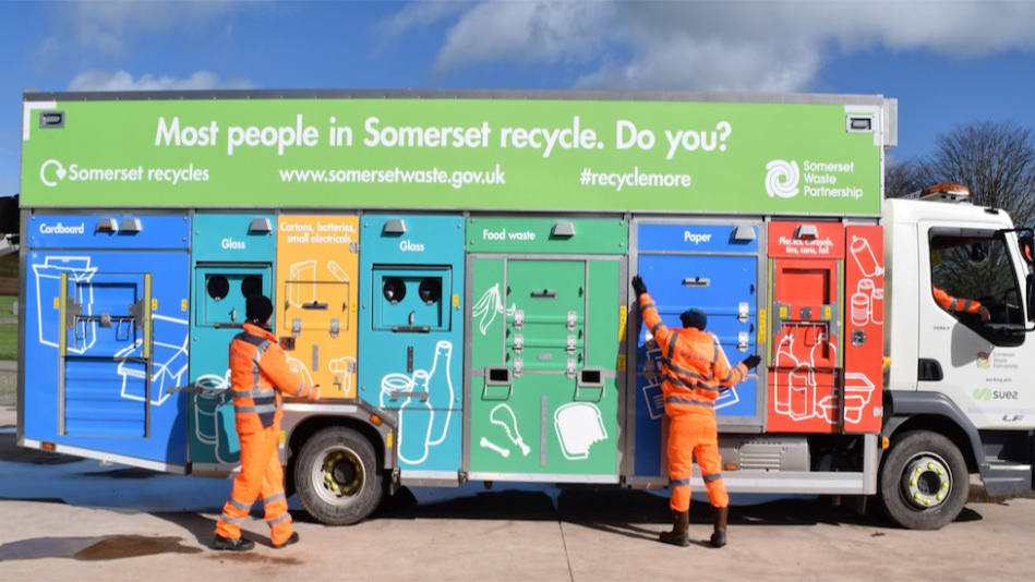 Waste operatives loading recycling into a Romaquip lorry.