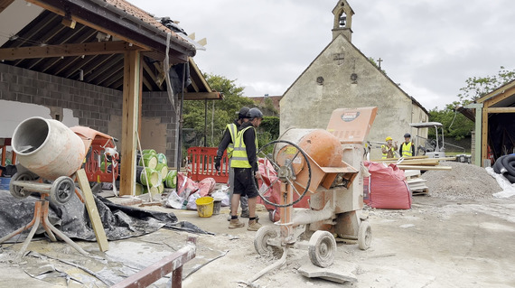 Photo shows building work well underway at Glastonbury Abbey.