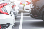 Parked cars in car park.