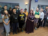 Staff from Somerset Council, Somerset in Care and Leaving Care Council with the award nominees celebrating with their certificate.