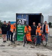 Suez workers with bikes