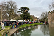 Wells Christmas Market on the Bishop's Palace Green in 2023.