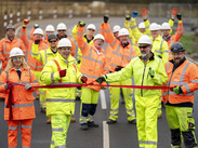 A group pf Octavius Regional Civil Engineering staff and workers celebrating and cutting a ribbon on Miner’s Arms junction.