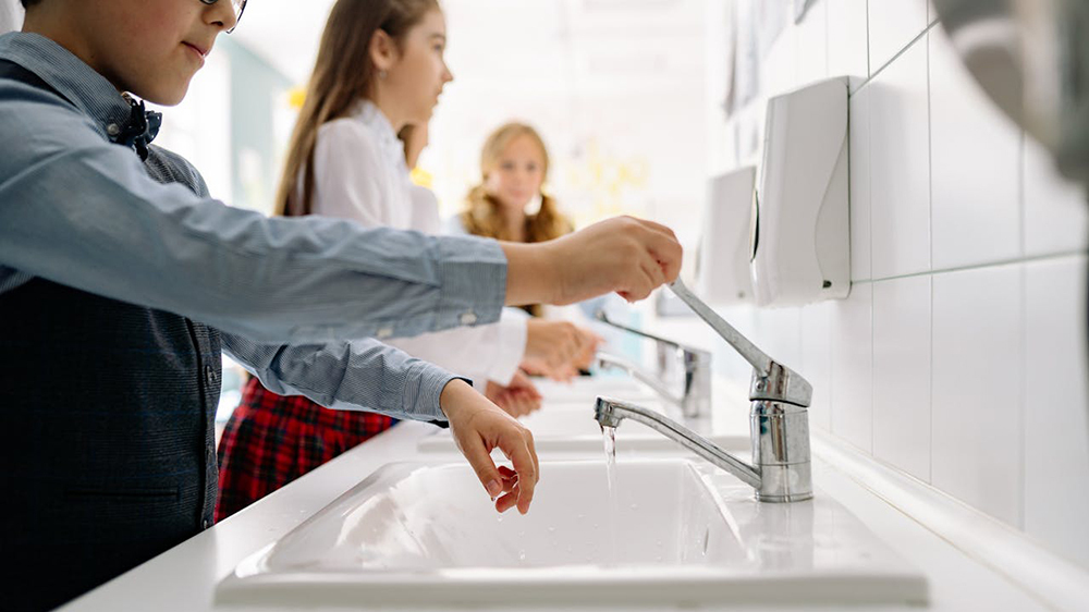 Stock image of school children washing their hands by Yan Krukau from Pexels.