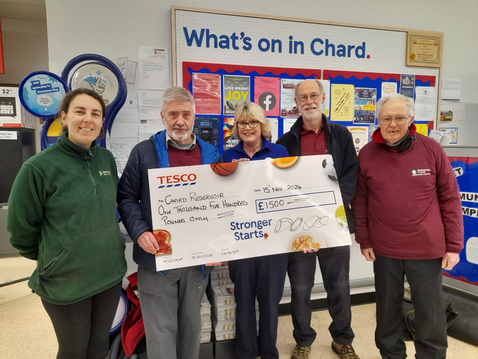 cheque presentation to chard team from tesco store in chard