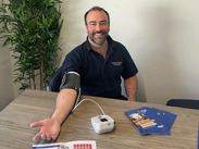 Joshua Strickland of Hatch Green Coaches having his blood pressure taken.