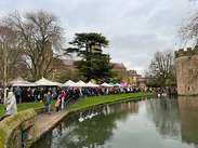 Wells Christmas Market on the Bishop's Palace Green in 2023.