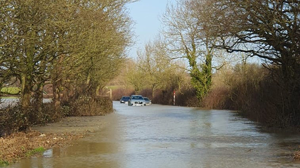 3 cars stranded in flood water in Somerset.