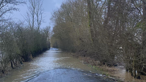 A rural flooded road in Somerset.