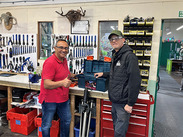 Houman and Duncan in the workshop at On your Bike.