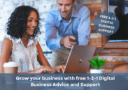 A man directing a woman on a laptop, captioned: 'Grow your business with free 1-2-1 digital business advice and support'.