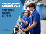 MAKE UK graphic featuring a young woman showing a male apprentice how to operate CNC machinery, captioned: 'Manufacturing Awards 2025'.