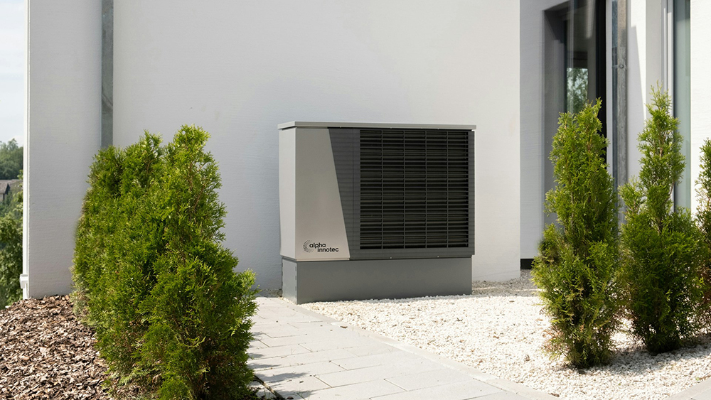 Stock image of an Air Source Heat Pump by Alpha Innotec from Unsplash.